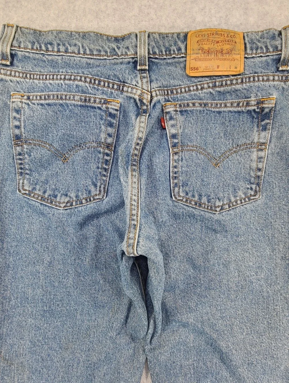 Vintage 90s Levi's Men's 556 Guys Fit Jeans Women 14 34x31 Medium Straight USA